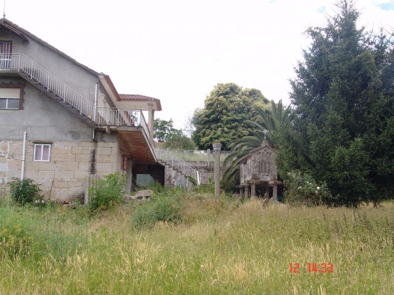 Vendo terreno con casa