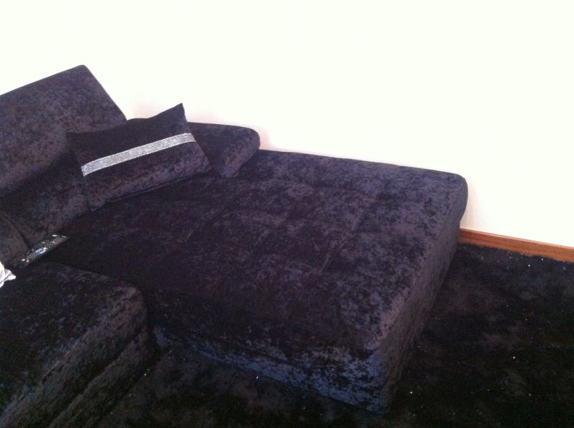 Sofá com chaise long