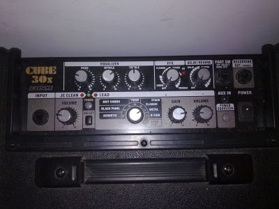 Guitarra electrica CORT M200 + Amplificador Roland Cube 30X