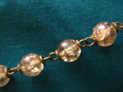 Vendo terço antigo com contas rosa