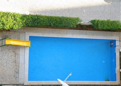 T1 NOVO A ESTREAR COM PISCINA E JARDIM PARA FÉRIAS EM PORTIMÃO