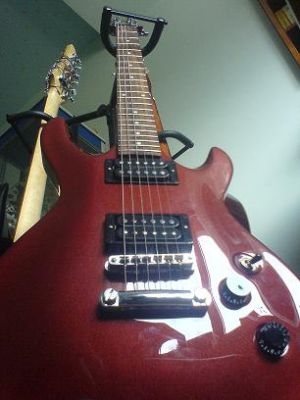 Guitarra electrica CORT M200 + Amplificador Roland Cube 30X