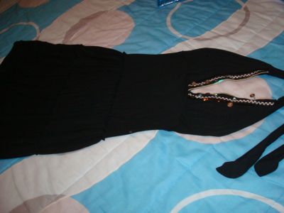 Roupas e botas semi-novas