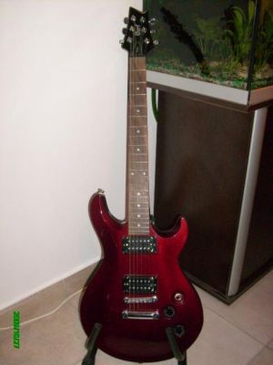 Guitarra electrica CORT M200 + Amplificador Roland Cube 30X