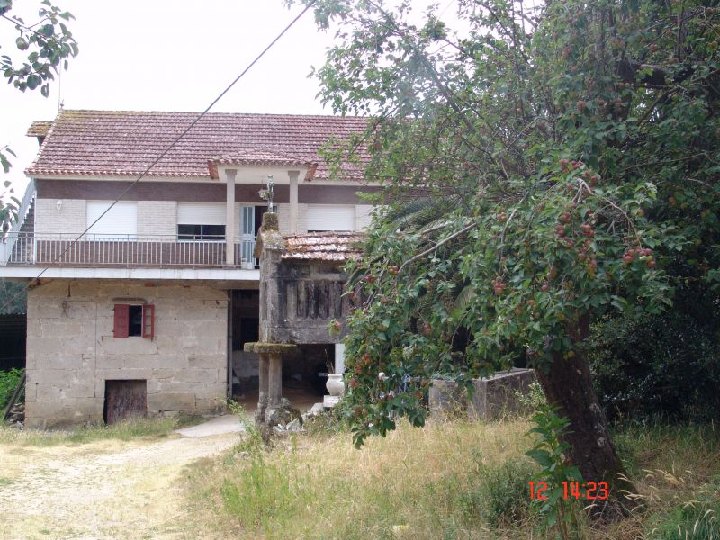 Vendo terreno con casa