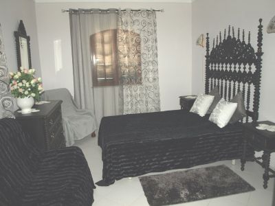 Vivenda térrea com piscina e vista mar 